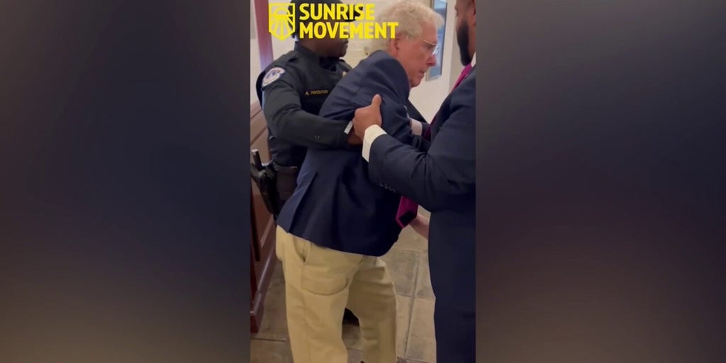 Sen. Mitch McConnell seen falling down while walking in Senate office hallway
