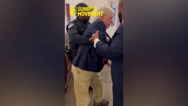 Sen. Mitch McConnell seen falling down while walking in Senate office hallway