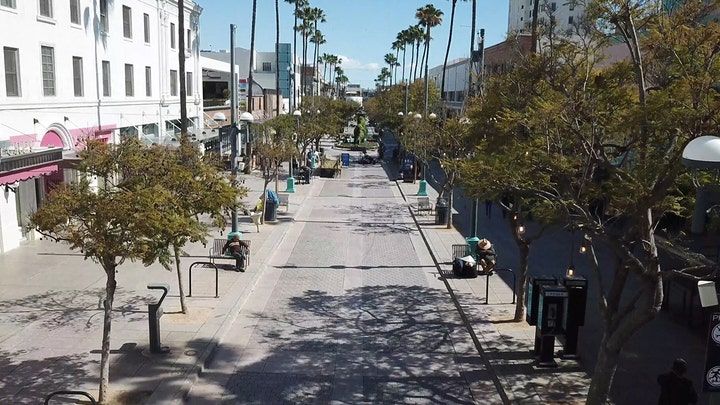 Normally bustling Third Street Promenade in Santa Monica is mostly silent amid coronavirus outbreak