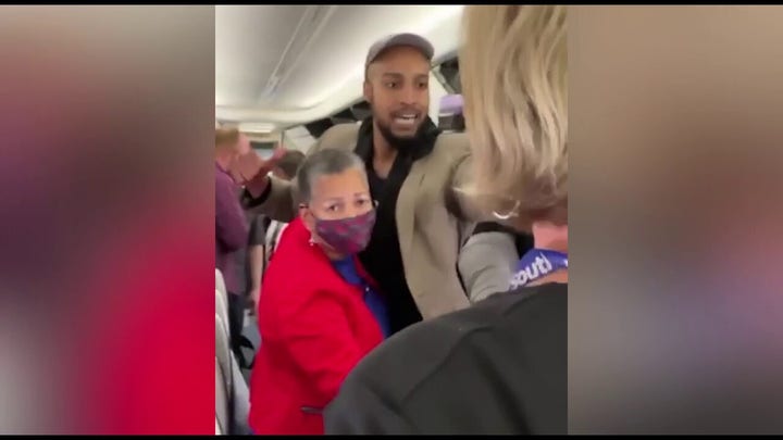 Man confronts passenger after fight on plane: 'Don't play with my family'