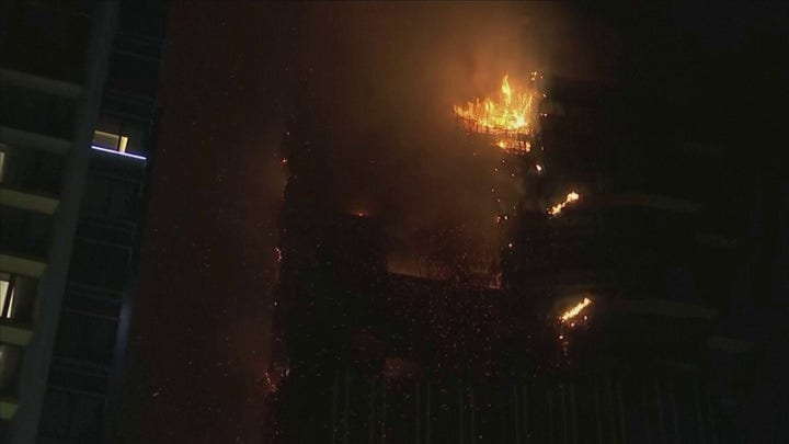 Massive Hong Kong fire consumes skyscraper under construction