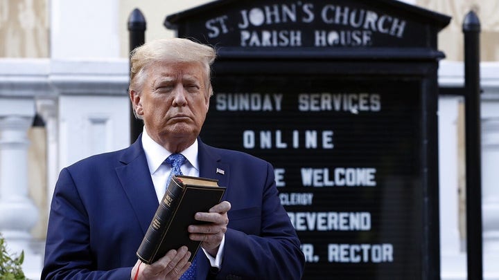 Debate over message sent by Trump's visit to burned DC church