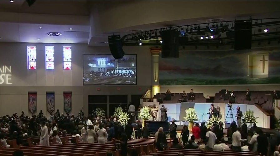Mourners arrive at George Floyd's funeral in Houston