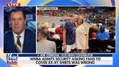 WNBA admits security was wrong to force fans to cover XX-XY women's sports shirts