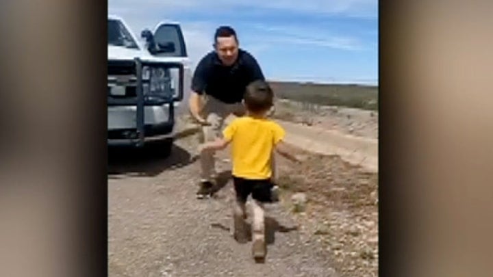 Raw video: Child runs to greet his father after weeks spent apart due to coronavirus