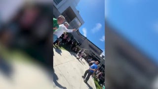 Video shows crowd ducking to ground after Charlie Kirk was assassinated
