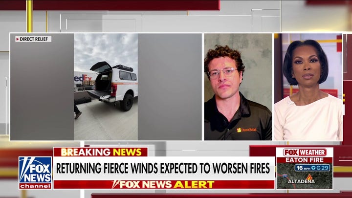 Image of a relief worker discussing the wildfires