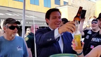 Democrat, GOP-run states pursue contrasting COVID strategies