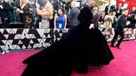 Oscars fashion: Billy Porter defies tradition and steps out onto the red carpet in a gown by designer Christian Siriano