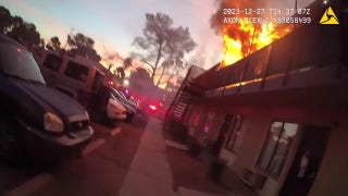 Las Vegas police officers' quick action saves woman from fire - Fox News