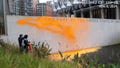 Members of Just Stop Oil sprayed orange paint on an exterior wall of the U.S. embassy in London on Wednesday after former President Trump was projected to retake the White House. (Courtesy: Jamie Lowe / Just Stop Oil) - Fox News