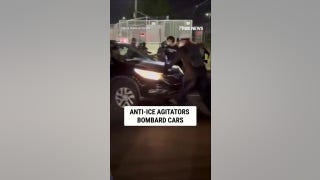 Anti-ICE agitators CONFRONT vehicles leaving ICE facility