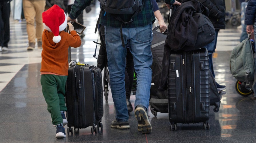 WATCH LIVE: Christmas travel rush hits airports as millions head out