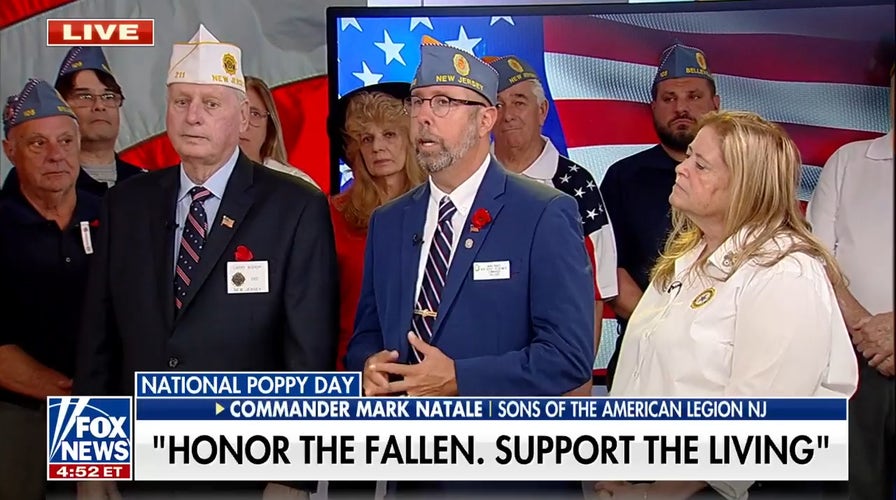 American Legion members explain the significance of Poppy Day