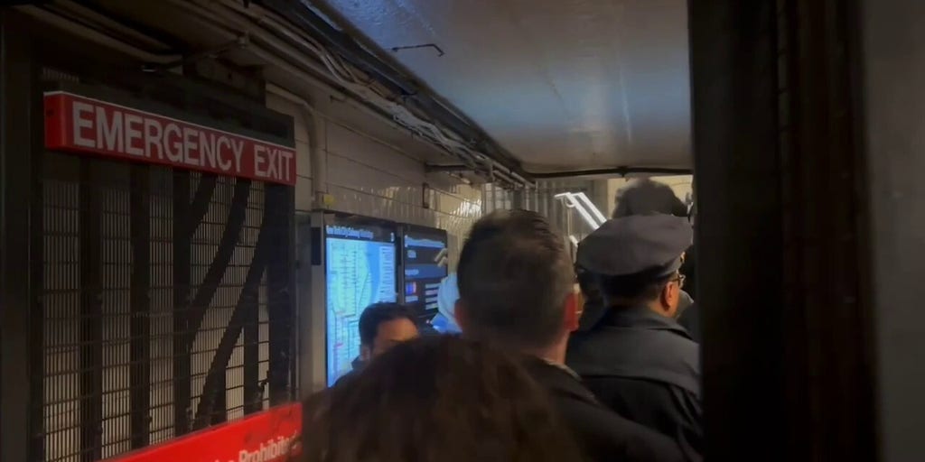 Video shows suspect perp walk in New Year's Eve subway shoving