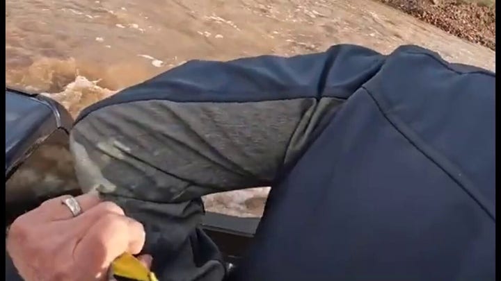 Helicopter rescue crew saves Arizona driver from flooded creek