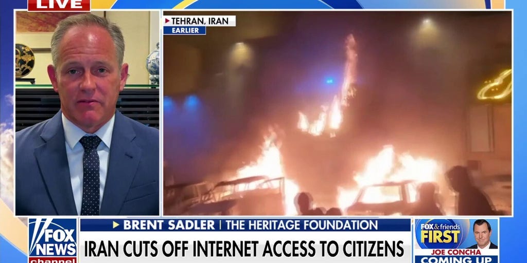 Iran cuts off internet access to citizens as protesters set fires in Tehran