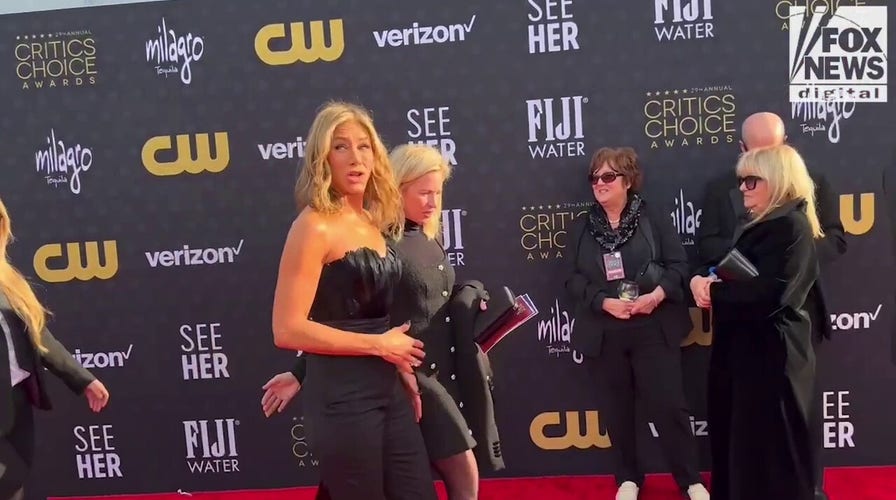 Jennifer Aniston dishes on her designer ensemble at the 2024 Critics Choice Awards