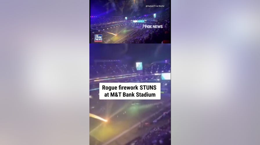  Rogue firework shoots onto the tract  of Ravens-Patriots game