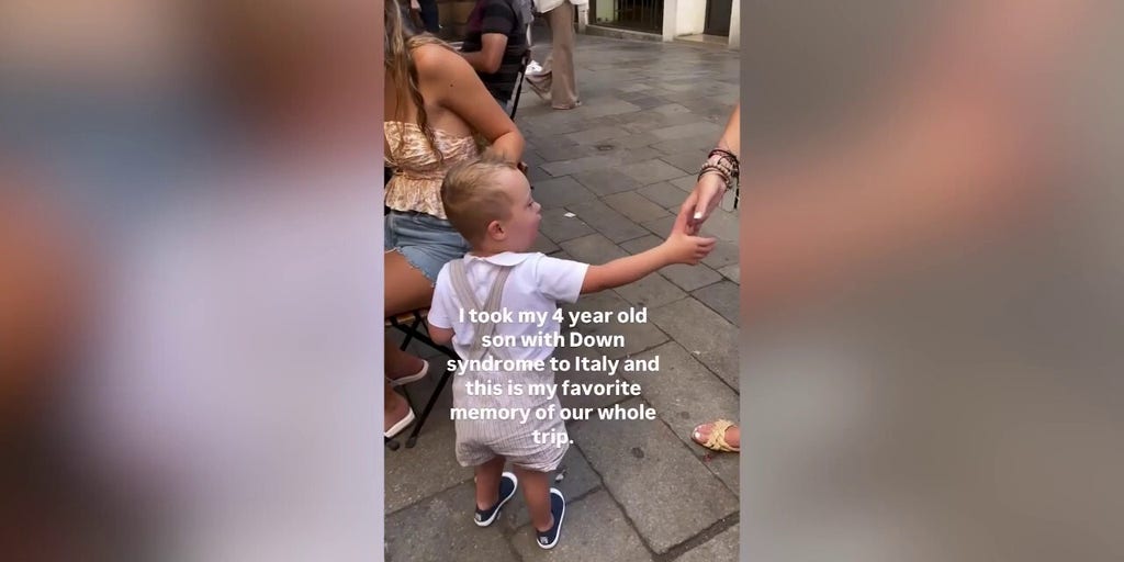 Boy sweetly pretends to serve coffee to his older sisters