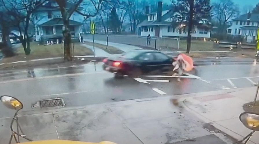 Maryland police officer saves student from being hit by car