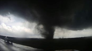 Tornado approaching road in the heartland caught on video