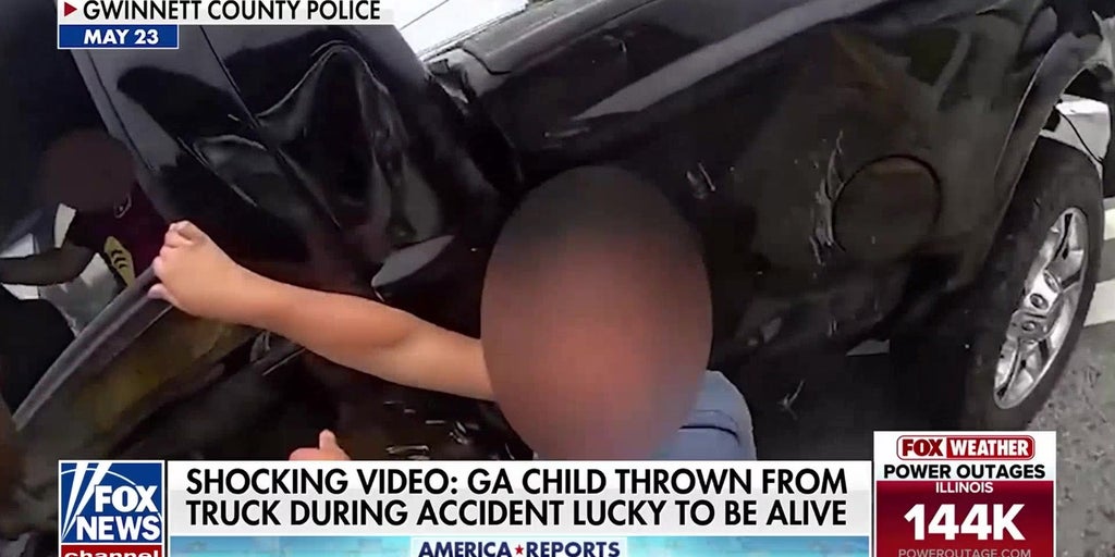 Police dashcam captures moment child is ejected from truck during crash
