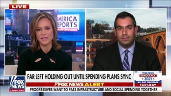 Progressives clash with Biden over spending package