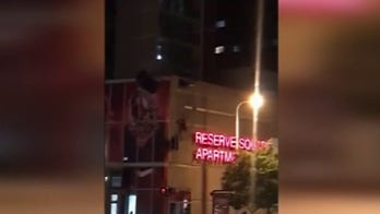 Cleveland BASE jumper slams into building on his way down, video shows