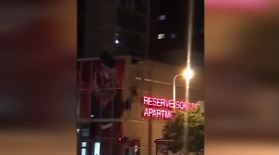 Parachute jumper slams into Cleveland building in stunt gone wrong
