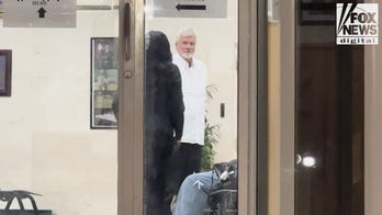 Brian Hooker prepares to leave jail