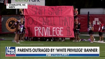 'White privilege' banner at high school football game disturbs parents
