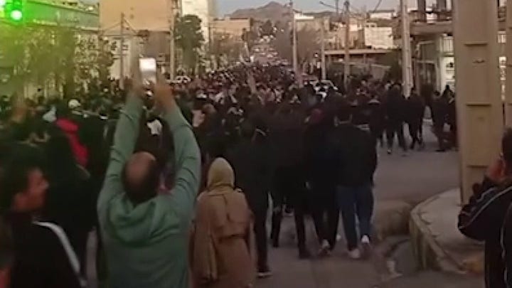Opposition group claims protesters have taken over 2 cities in Iran