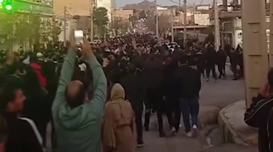 Opposition group claims protesters have taken over 2 cities in Iran