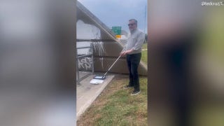 Cruz paints over “F--- Charlie Kirk” graffiti near Houston highway bridge