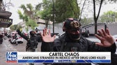 Americans stranded in Mexico after drug lord killed