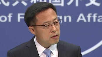 US accuses China of targeting COVID-19 research	