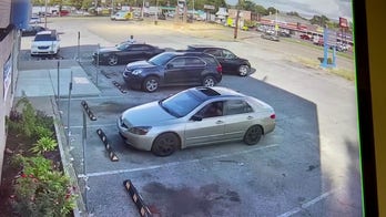 Flash of gunfire seen across the street during Ezekiel Kelly's Memphis shooting spree 