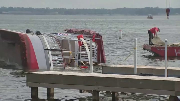 Texas double-deck party boat overturns on lake with children aboard