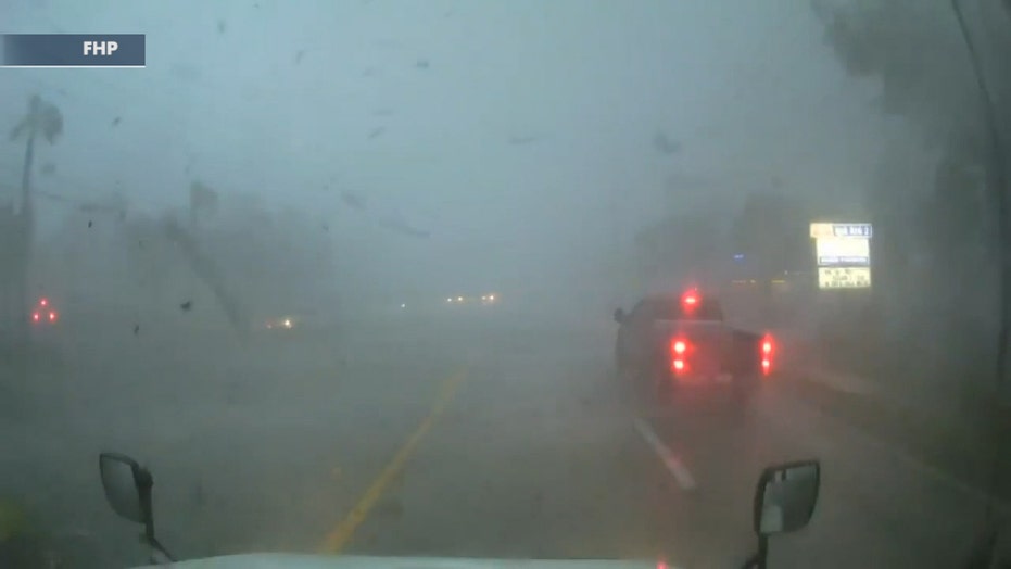 Truck caught in suspected tornado flips on its side in Florida