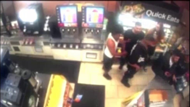Los Angeles flash mob vandalizes 7-Eleven