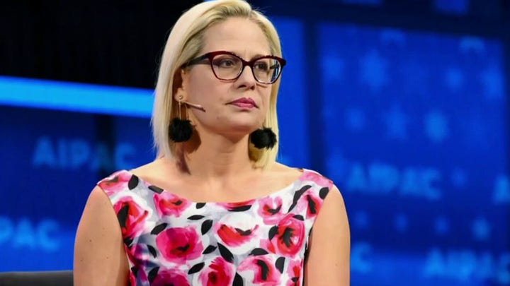 The left attacks Sen. Kyrsten Sinema for changing party, registering as independent