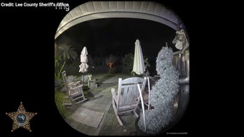 Police video of woman throwing brick in ex-husbands window