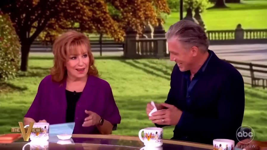 'The View' host shocks audience, co-hosts after kissing guest Anson Mount on the lips