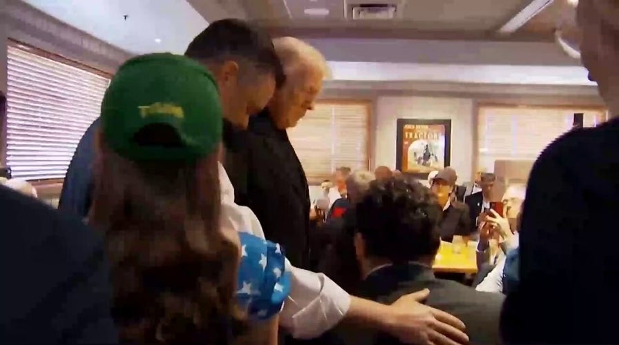 WATCH: Iowa diner asks Trump if he can pray for him before speech
