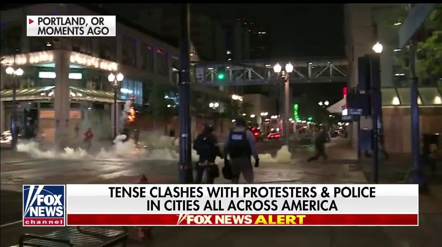 Police clash with protesters in Portland, Oregon