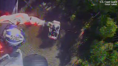 Dramatic video shows helicopter rescuing missing hiker from remote island