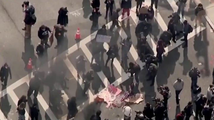 Left-wing, right-wing protest groups clash in major US cities