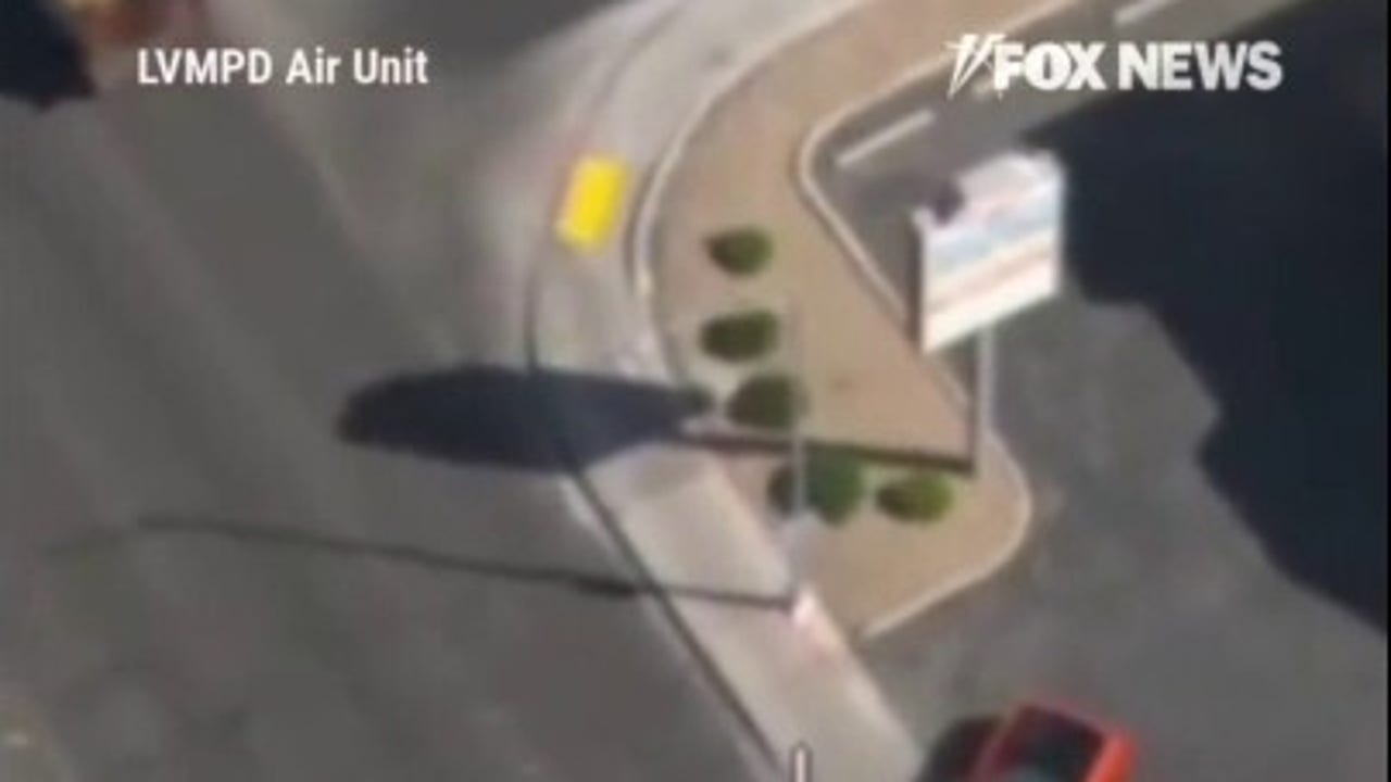 Bystander TACKLES suspect who fled car crash scene during police chase