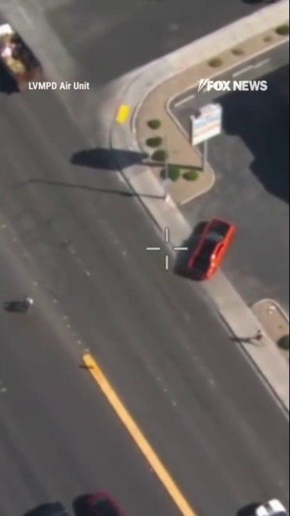 Bystander TACKLES suspect who fled car crash scene during police chase